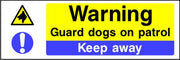Warning Guard dogs on patrol Keep away sign