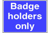 Badge Holders Only parking sign
