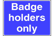Badge Holders Only parking sign