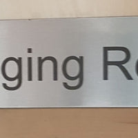 Stainless steel changing room door sign