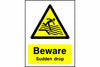 Beware Sudden drop safety sign