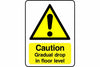 Caution Gradual drop in floor level sign