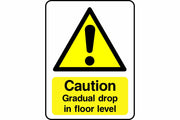 Caution Gradual drop in floor level sign