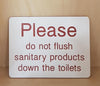 Engraved Please do not flush sanitary products sign