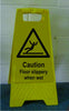 Caution Floor slippery when wet sign