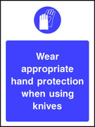Wear appropriate hand protection when using knives sign