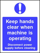 Keep hands clear when machine is operating sign