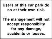 Users of this car park do so at their own risk sign