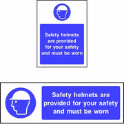 Safety helmets are provided for your safety and must be worn sign