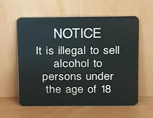Engraved It is illegal to sell alcohol to persons under the age of 18 sign