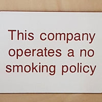 Engraved This company operates a no smoking policy sign