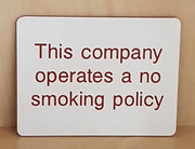 Engraved This company operates a no smoking policy sign