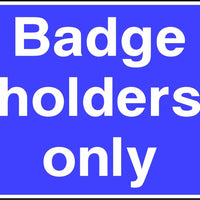 Badge Holders Only parking sign
